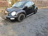 Volkswagen VW Beetle Auto. - gebrauchte Volkswagen Beetle aus dem Jahr 2004