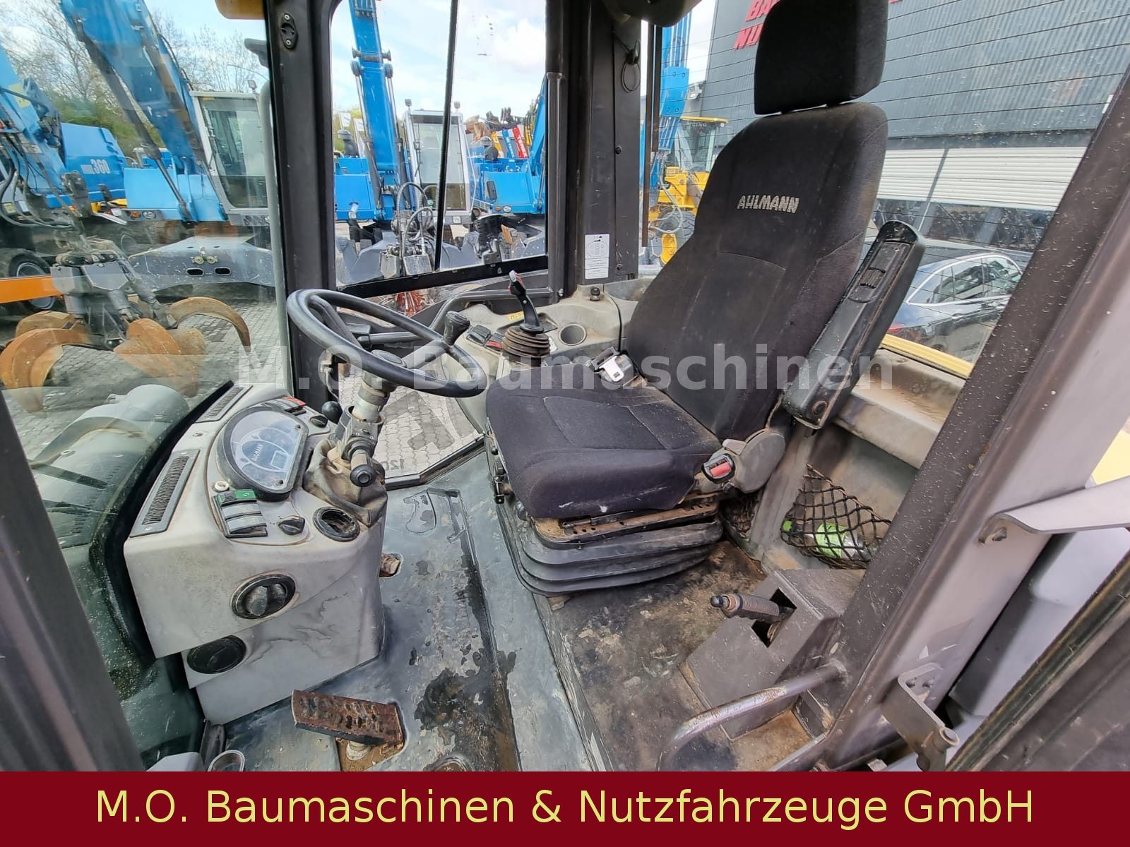 Fahrzeugabbildung Ahlmann AF 1200 / SW / Klappschaufel / Gabel