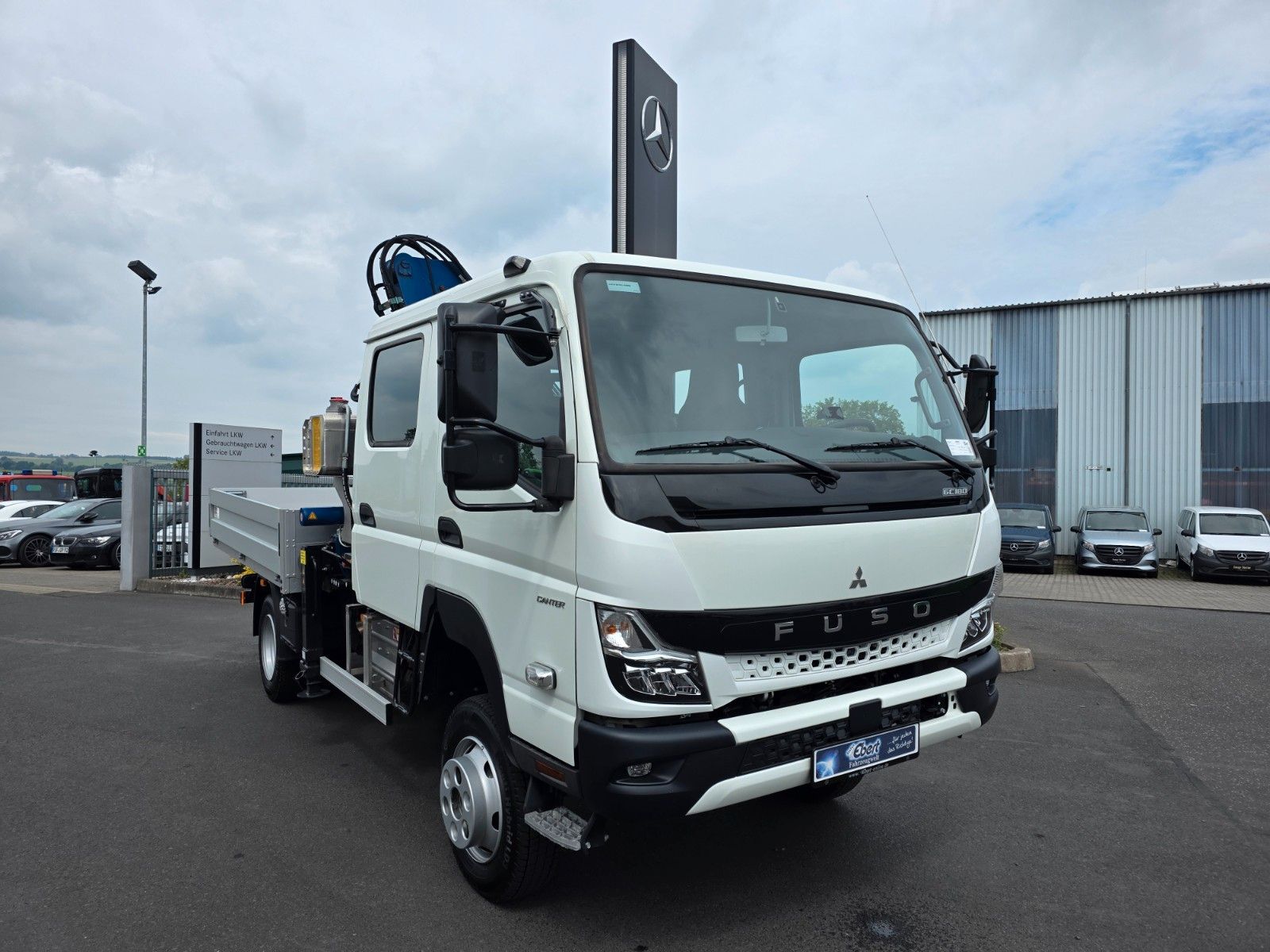 Fahrzeugabbildung Mitsubishi Fuso Canter 6C18D DoKa 4x4 Kran Atlas 65.2 - A2