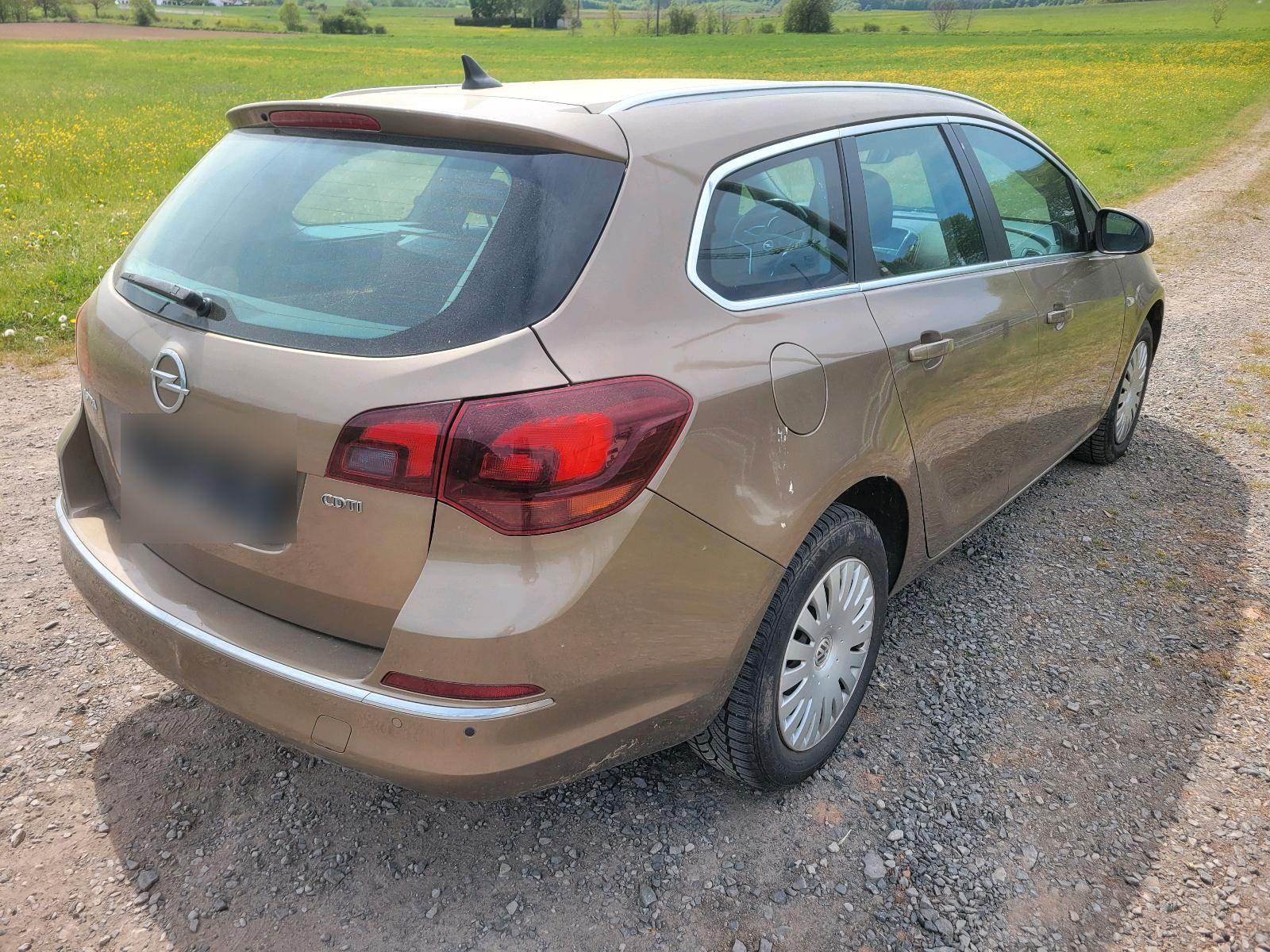 Opel Astra 2014 — engine 165 HP (121kW)