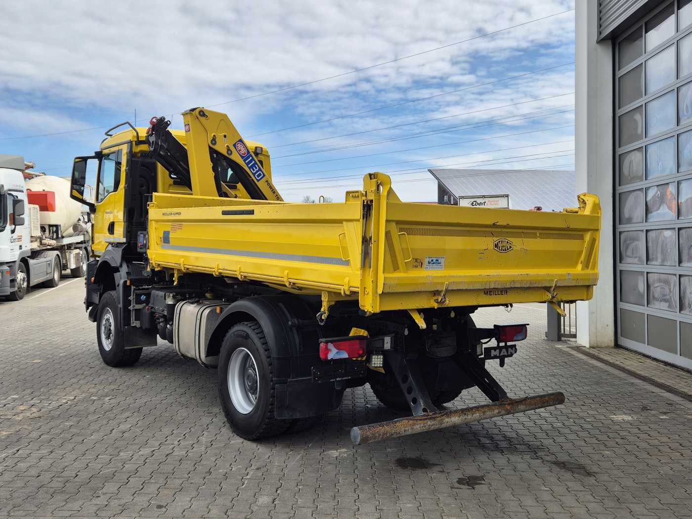 Fahrzeugabbildung MAN TGS 18.430 4x4 BL Kran HMF 1130K-RCS Funk AHK