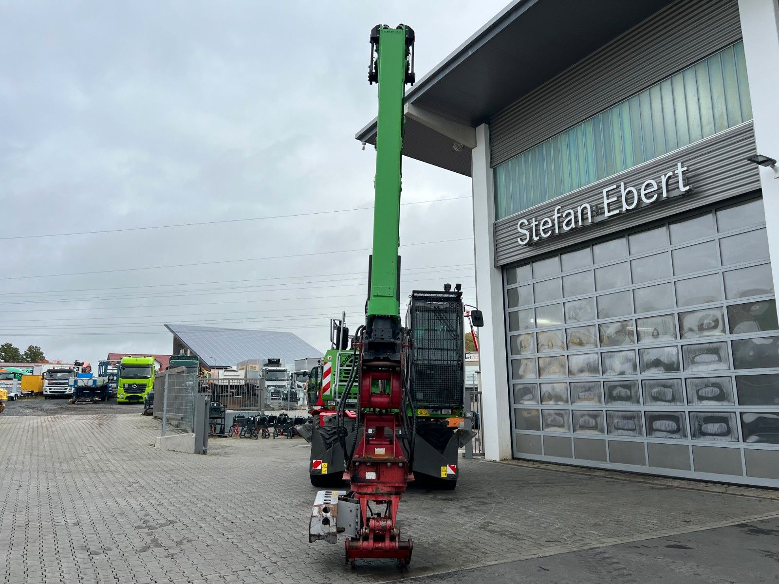 Fahrzeugabbildung Sennebogen 718 / inkl. Vosch Fällzange / nur 1.965h!