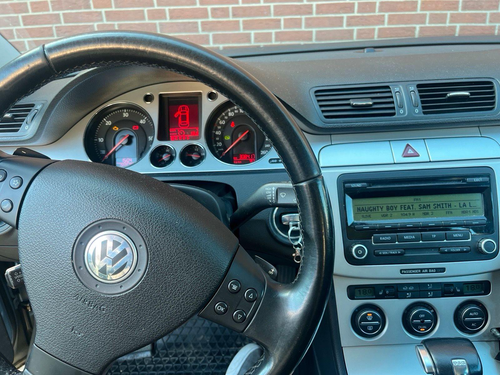 Volkswagen Passat 2009 — photo 14