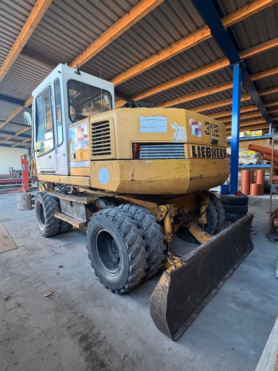 Liebherr A 312 / Mobilbagger / New Motor