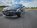Toyota Corolla 1,8 Hybrid Team Deutschl Touring Spo... - Toyota Corolla Gebrauchtwagen in Frankfurt