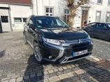 Mitsubishi Outlander 2.4 MIVEC PLUG-IN HYBRID 4WD Spirit AH - Mitsubishi Outlander in Mönchengladbach