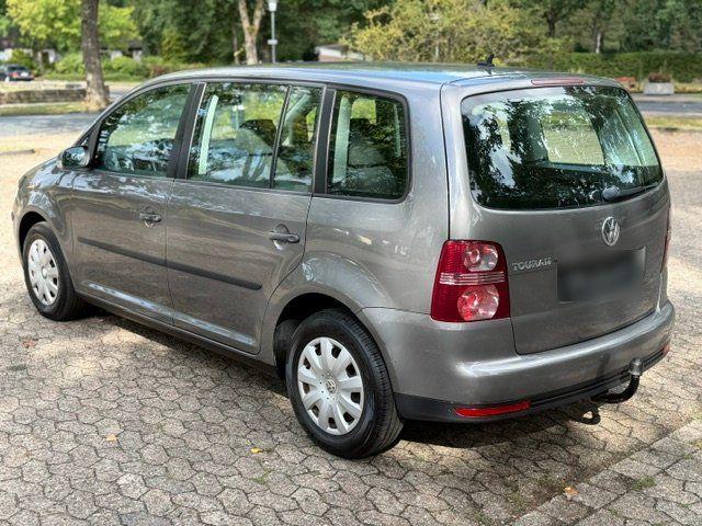 Volkswagen Touran 2009 — engine 105 HP (77kW)