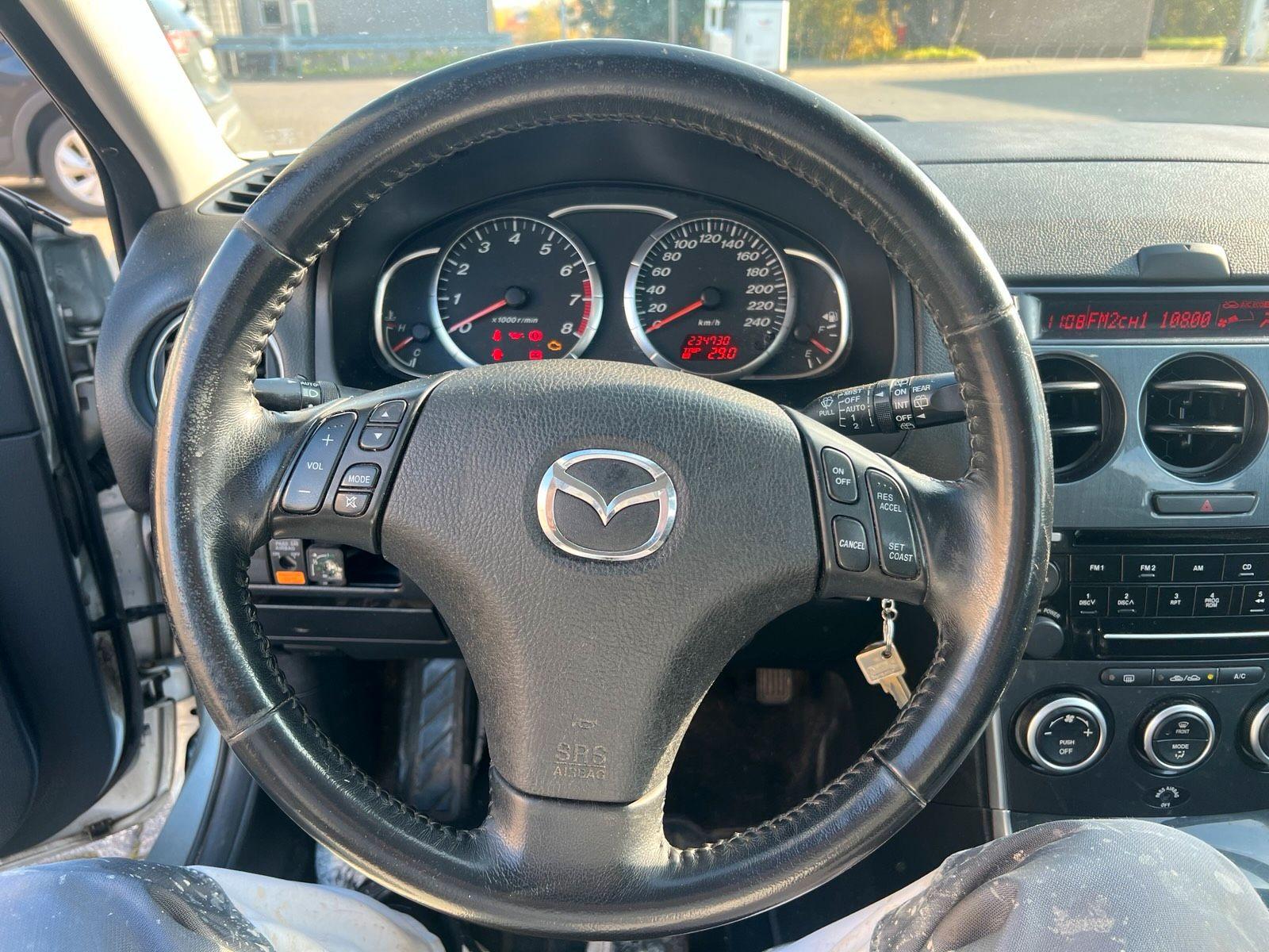 Mazda 2 2007 — фото 13