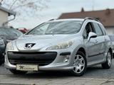 Peugeot 308 SW Tendance 1,6 DIESEL NAVI KLIMA PDC AHK - Peugeot 308 aus 2009: SW
