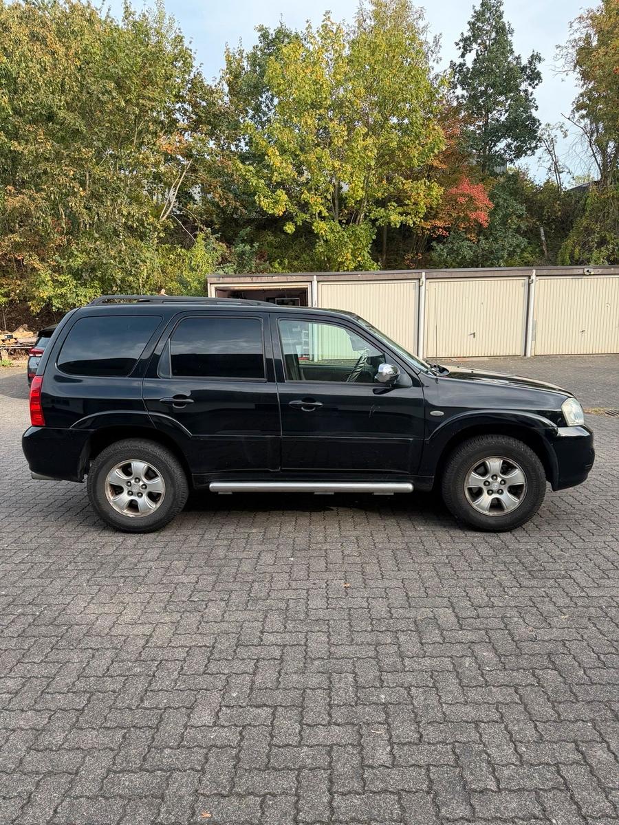 Mazda Tribute 2004 — engine 150 HP (110kW)