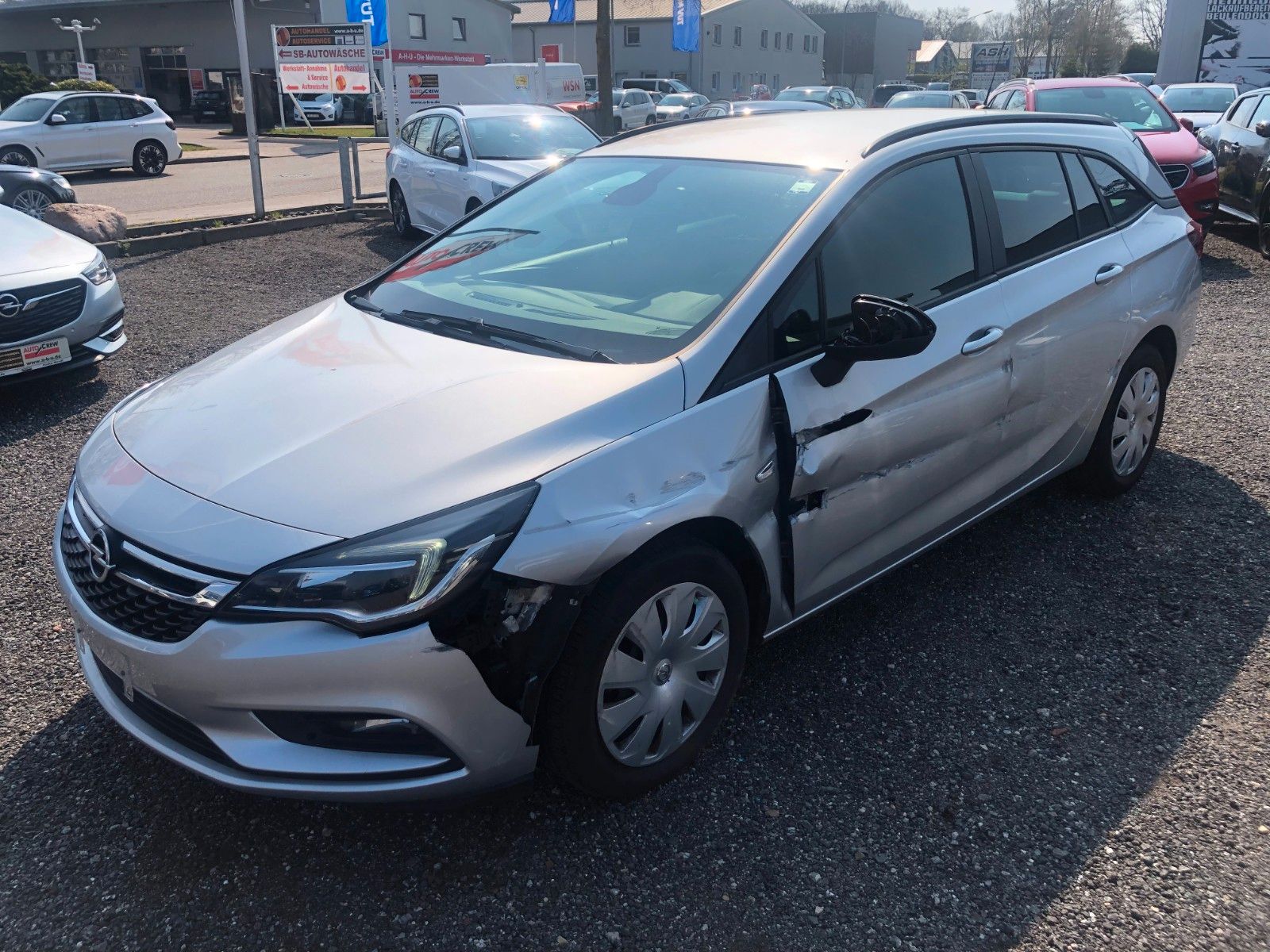 Fahrzeugabbildung Opel Astra K SportsTourer Business Unfall Fahrerseite