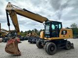 CAT M320F - CAT Mobilbagger M320