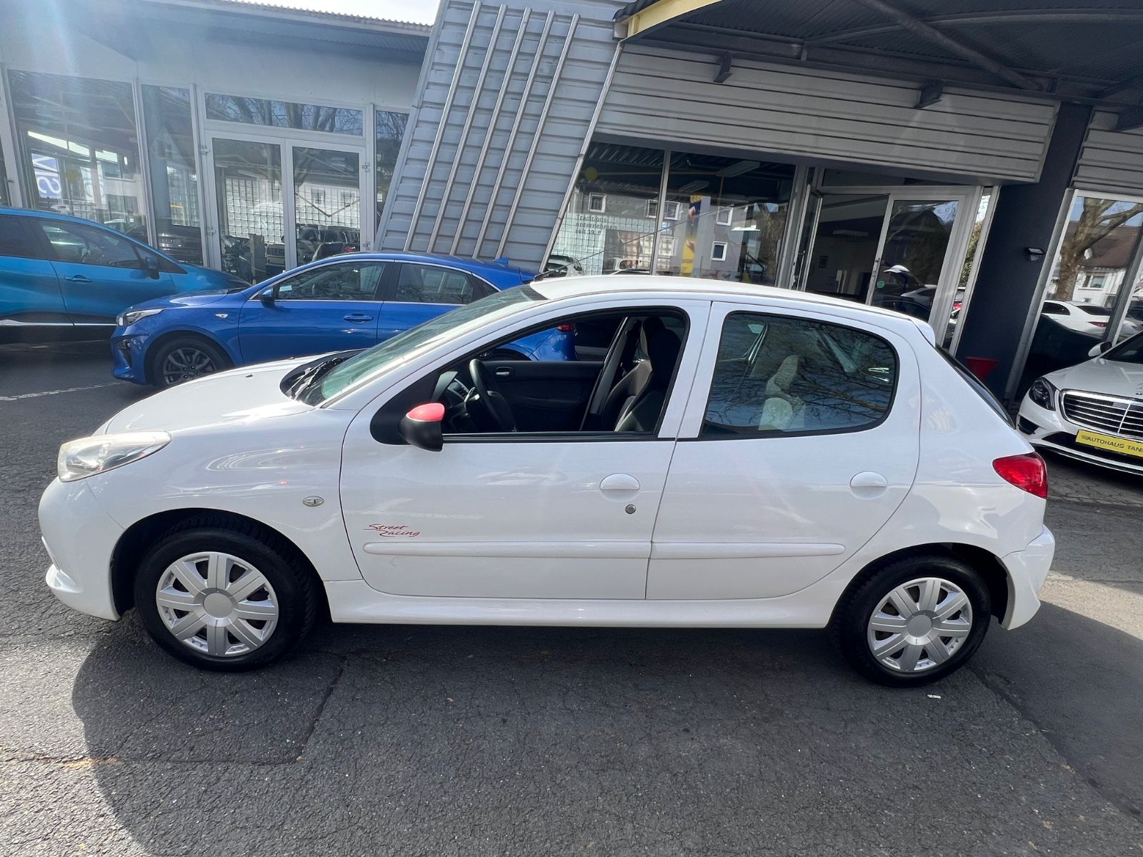 Fahrzeugabbildung Peugeot 206 + Sport Racing Edition*TÜV/ÖL NEU*