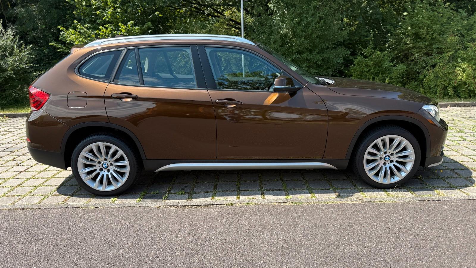 BMW X1 2014 — engine 1.998 cm³, 184 HP (135kW)