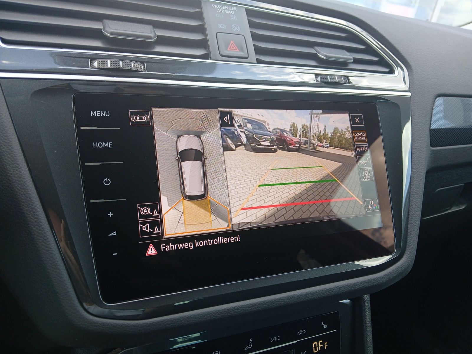 Fahrzeugabbildung Volkswagen Tiguan TDI United DSG Matrix Navi HUD AID ACC RF