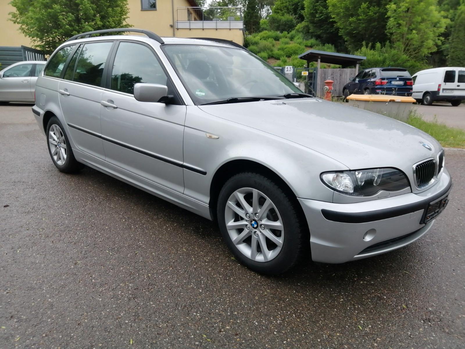 BMW 318 2005 — rear view