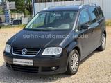 Volkswagen Touran Highline AUTOMATIK/Xenon/Navi/Sitzhzg/AHK - Gebrauchtwagen mit Automatik bis 2.000 Euro
