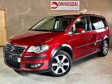 Volkswagen Touran CrossTouran°KLIMA°SHZ°PDC°TÜV NEU°XENON° - gebrauchte VW Touran aus dem Jahr 2009