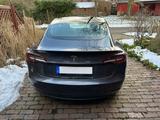 Tesla Model 3 Langstreckenbatterie - Hinterradantr... - graue Tesla Model 3