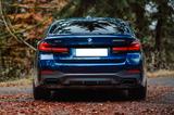 BMW M550 Vollausstattung: B&W/Massage/Prem.Sel./360° - blaue BMW 550