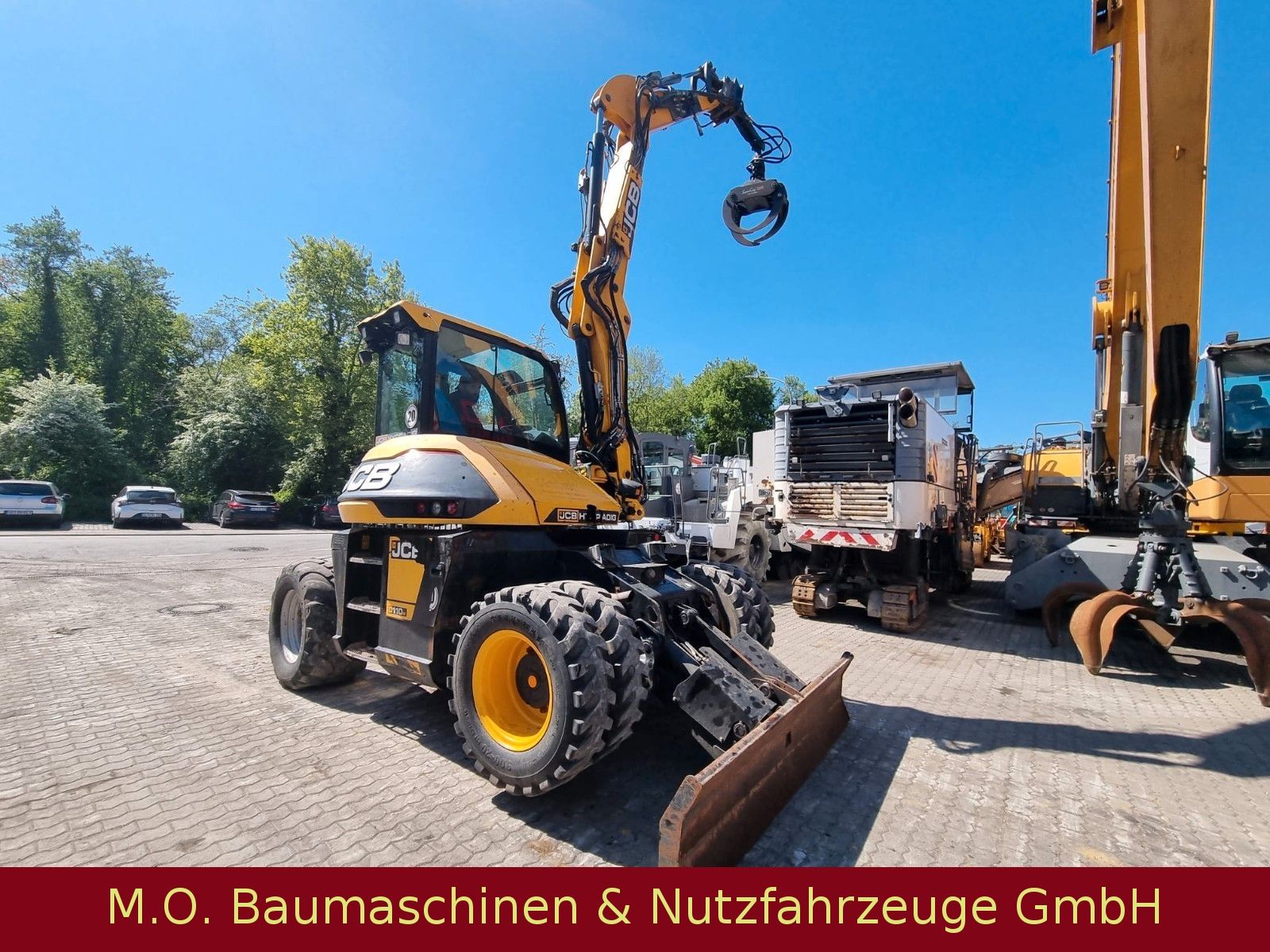 Fahrzeugabbildung JCB 110 W Hydradig / Holzgreifer / 2x Tieflöffel