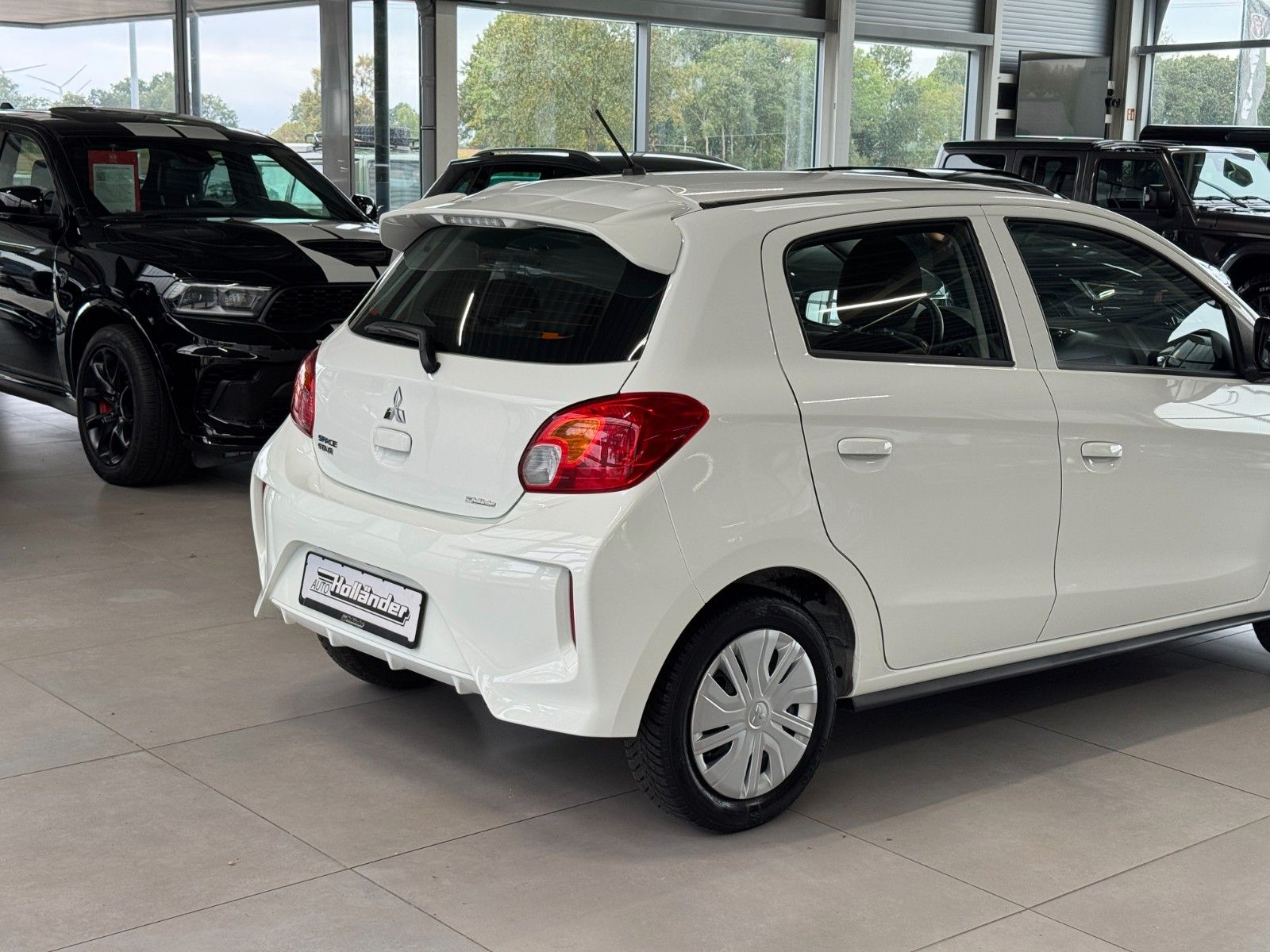 Fahrzeugabbildung Mitsubishi Space Star 1.2 Select "Ganzjahresreifen ZV DAB"