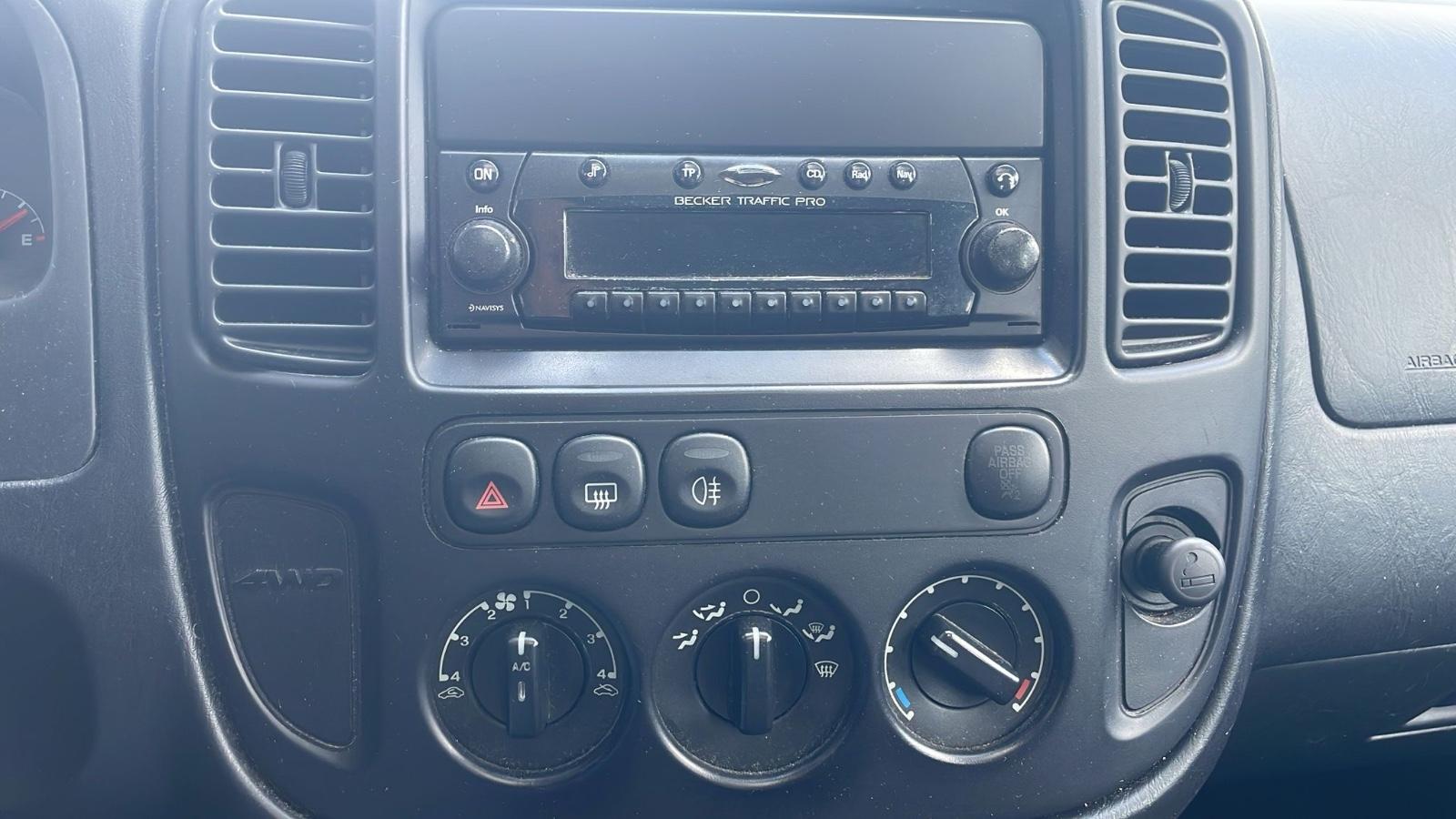 Ford Maverick 2004 — photo 12