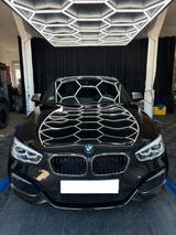 BMW M140i xDrive Special Edition und BMW Service - schwarze BMW M140i