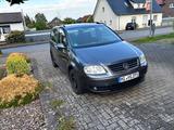 Volkswagen Touran 1.9 TDI 77kW DSG Basis Basis - Volkswagen Touran: Basis