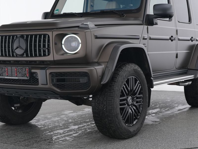 Fahrzeugabbildung Mercedes-Benz G63AMG 4x4² Dachträger Holzboden NightI+II MAGNO