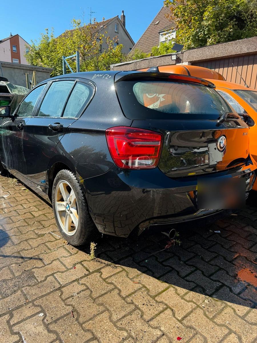 BMW 116 2011 — rear view