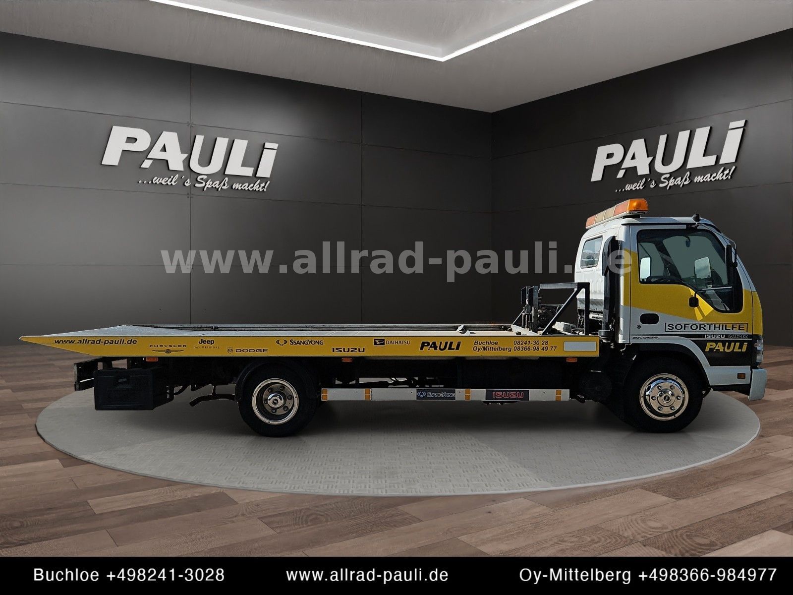Isuzu N-Serie NPR85P - Schlepper | Schiebeplateau