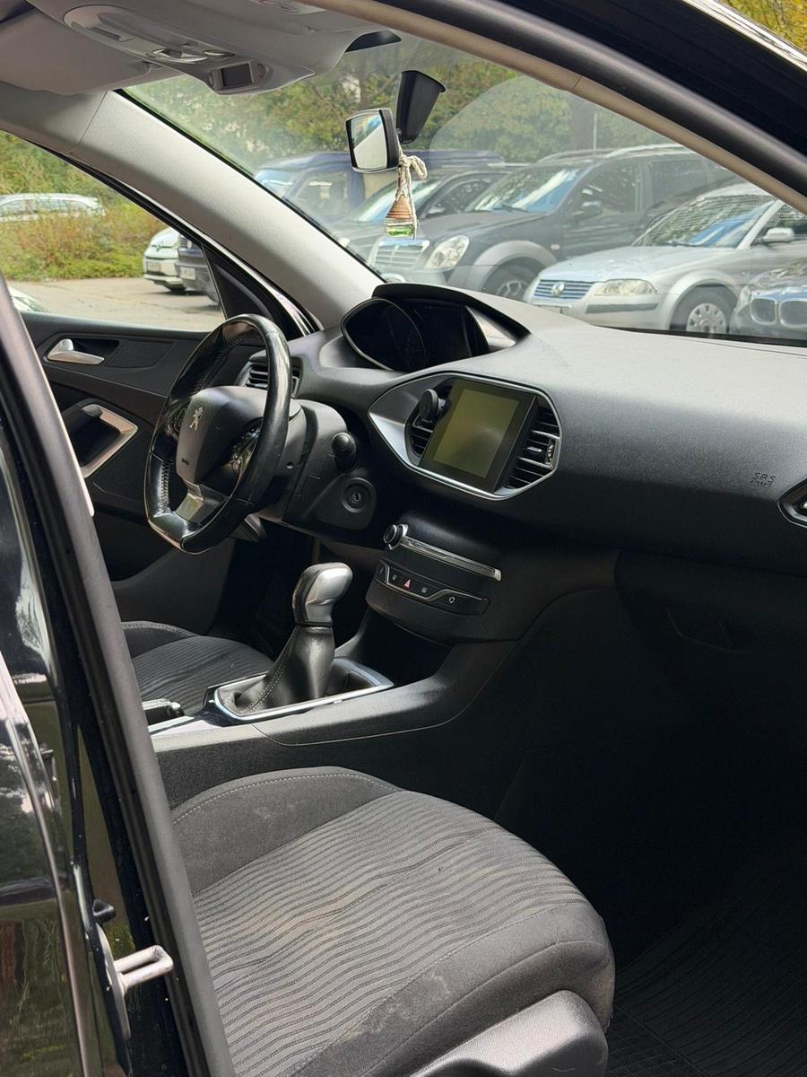 Peugeot 308 2014 — photo 12