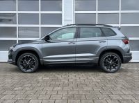 Skoda Karoq 1.5 TSI DSG Sportline PANO KAM AHK 4JGAR bei Autohaus Landmann & Maier OHG