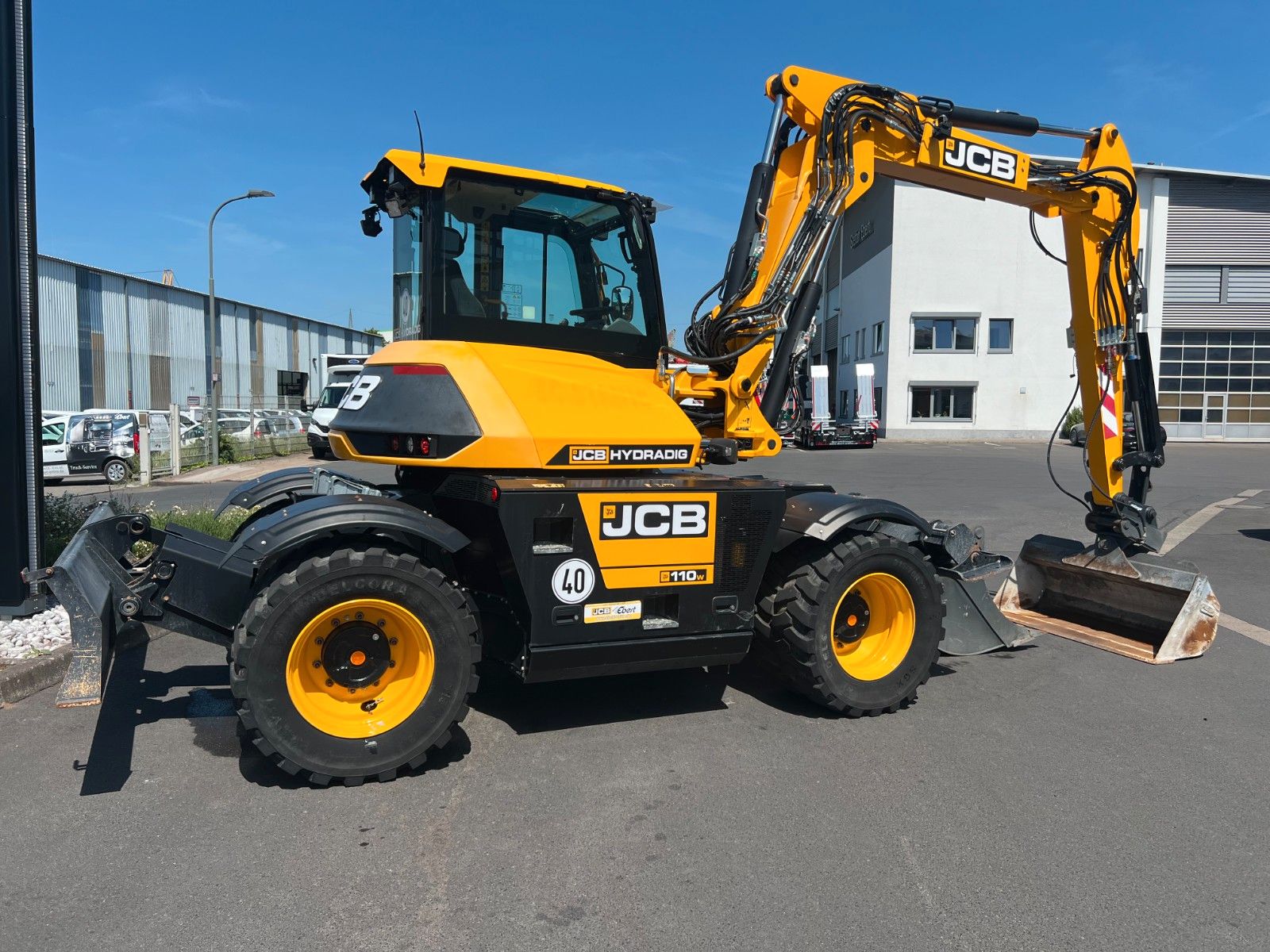 Fahrzeugabbildung JCB Hydradig 110W / Pratzen / nur 179h / Löffelpaket