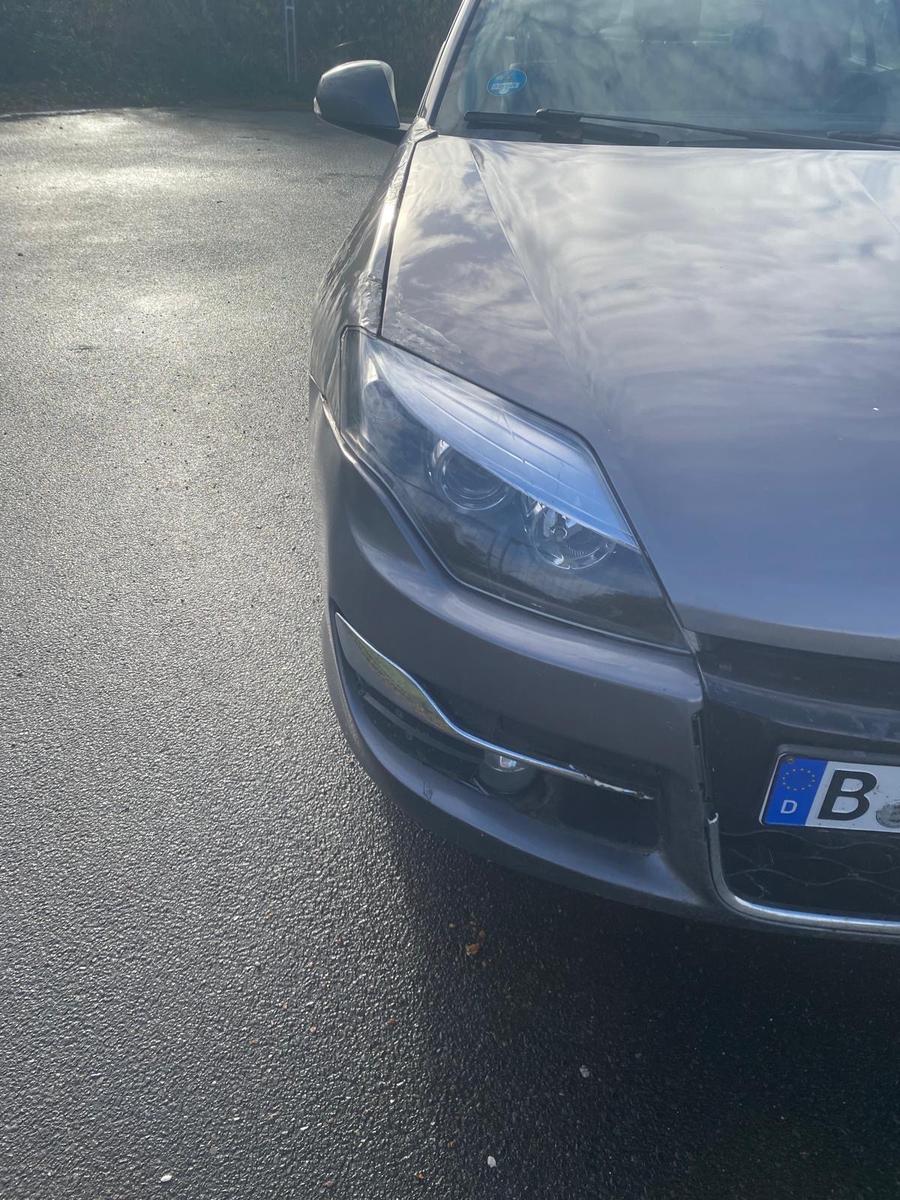 Renault Laguna 2012 — photo 14