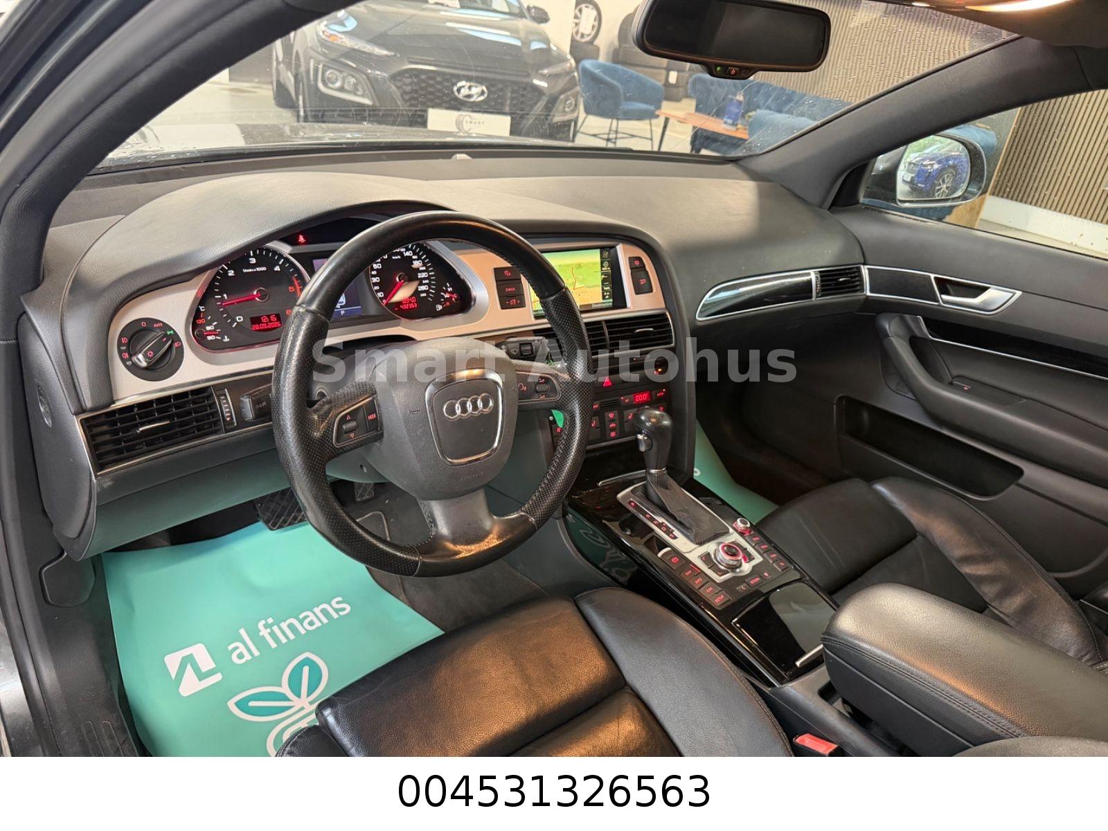 Audi A6 2009 — photo 13