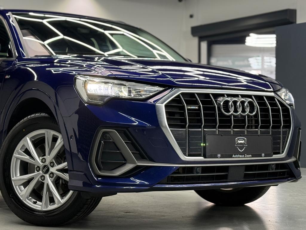 Audi Q3 40 TDI quattro S line, Foto 13 von 50