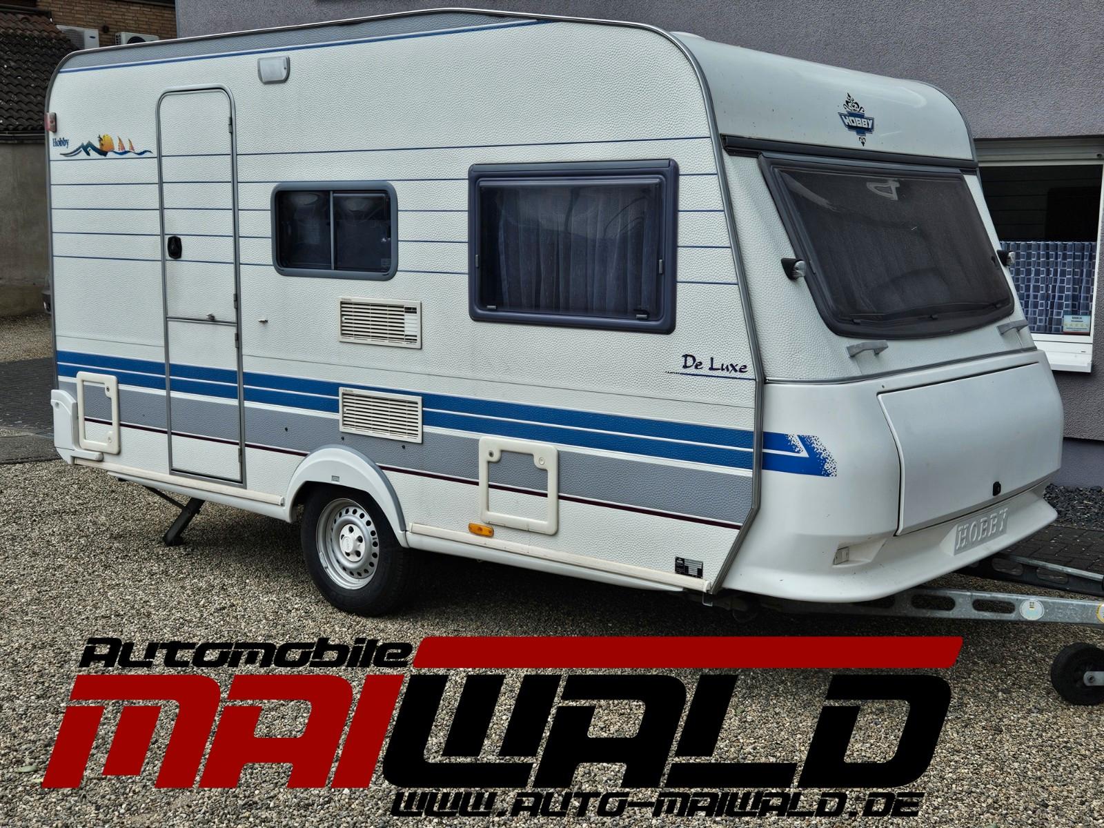 Hobby de luxe 400, 100km, 2 Sitzgruppen,  4Pers., Zelt