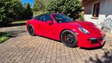 Porsche 911. 1 Carrera 4 GTS Cabriolet - rote Porsche 911 Urmodell