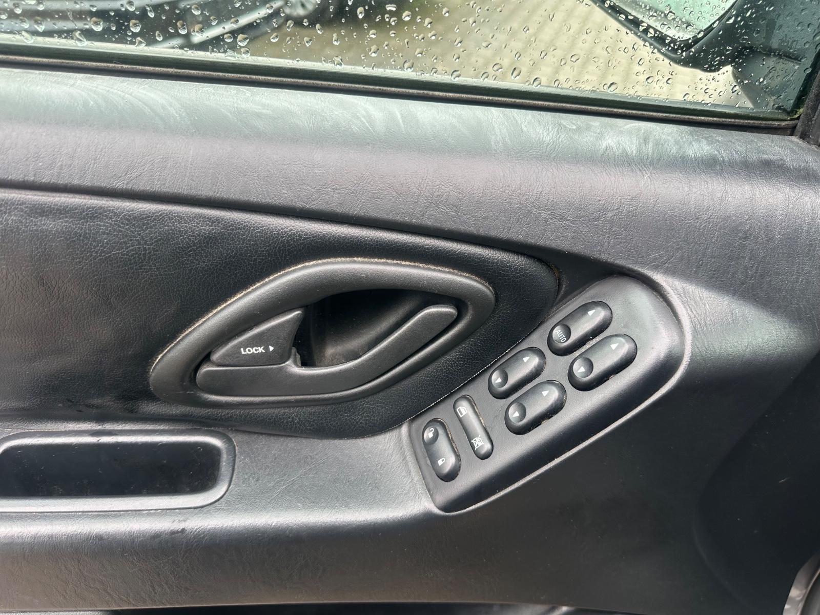 Ford Maverick 2005 — photo 12