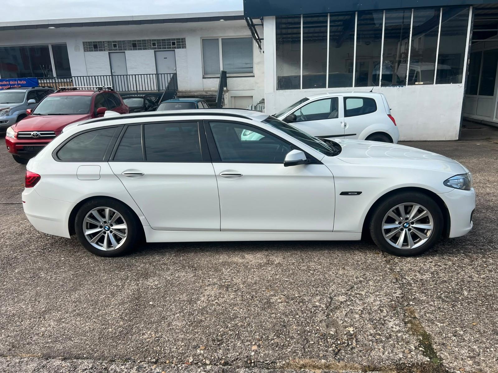 BMW 520 2013 — rear view