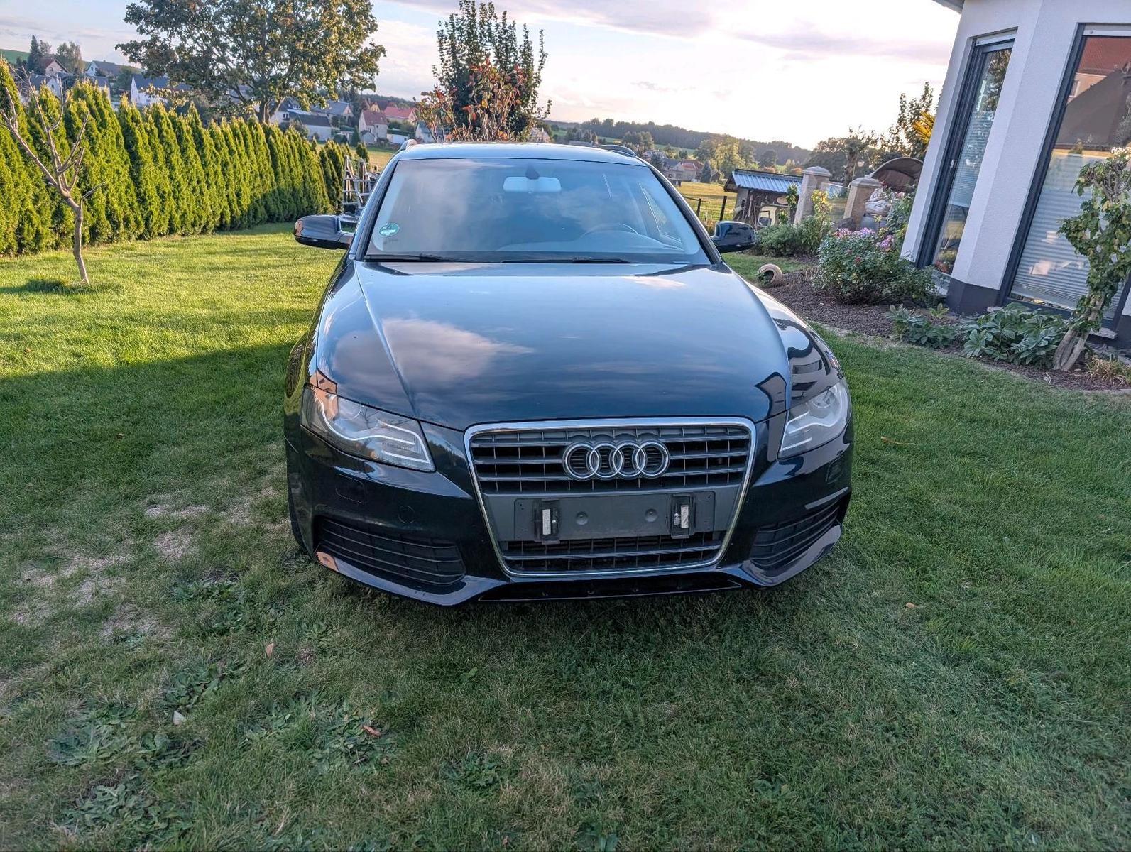 Audi A4 2009 — photo 12