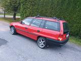 Opel Astra F Caravan, Spartan rot - gebrauchte Opel Astra aus dem Jahr 1993