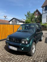 Suzuki Jimny Cabrio 1.3 4WD in Metallic grün - Suzuki Jimny mit Schiebedach