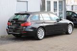BMW 318 d Touring Automatik Modern Line+Navi+AHK+Xen - BMW 318: Schwarz