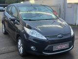 Ford Fiesta Ghia 1.25 KLIMAA+PDC+1.HAND+SCHECKHEFT - Ford Fiesta Ghia mit Benzin-Antrieb