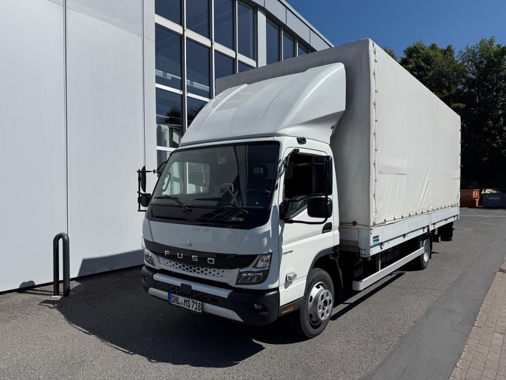 Fahrzeugabbildung FUSO CANTER 7C18 AMT 4x2  Pritsche Plane Ladebordw.