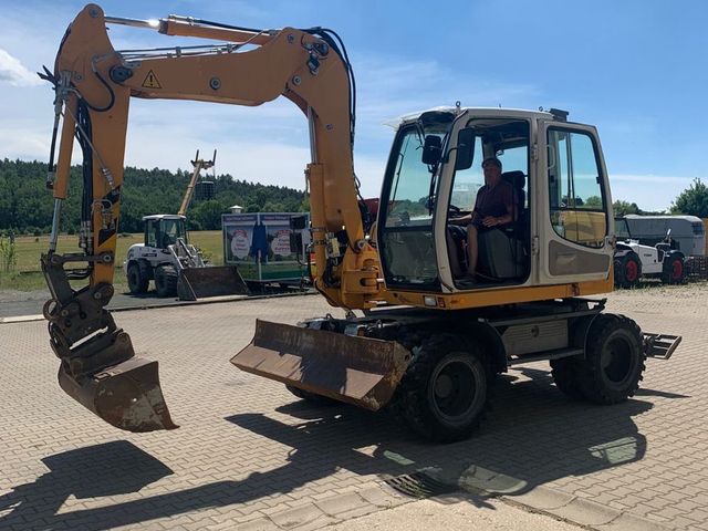 Liebherr A 309 Powertilt Klima Bratzen  inkl. 3 Schaufeln