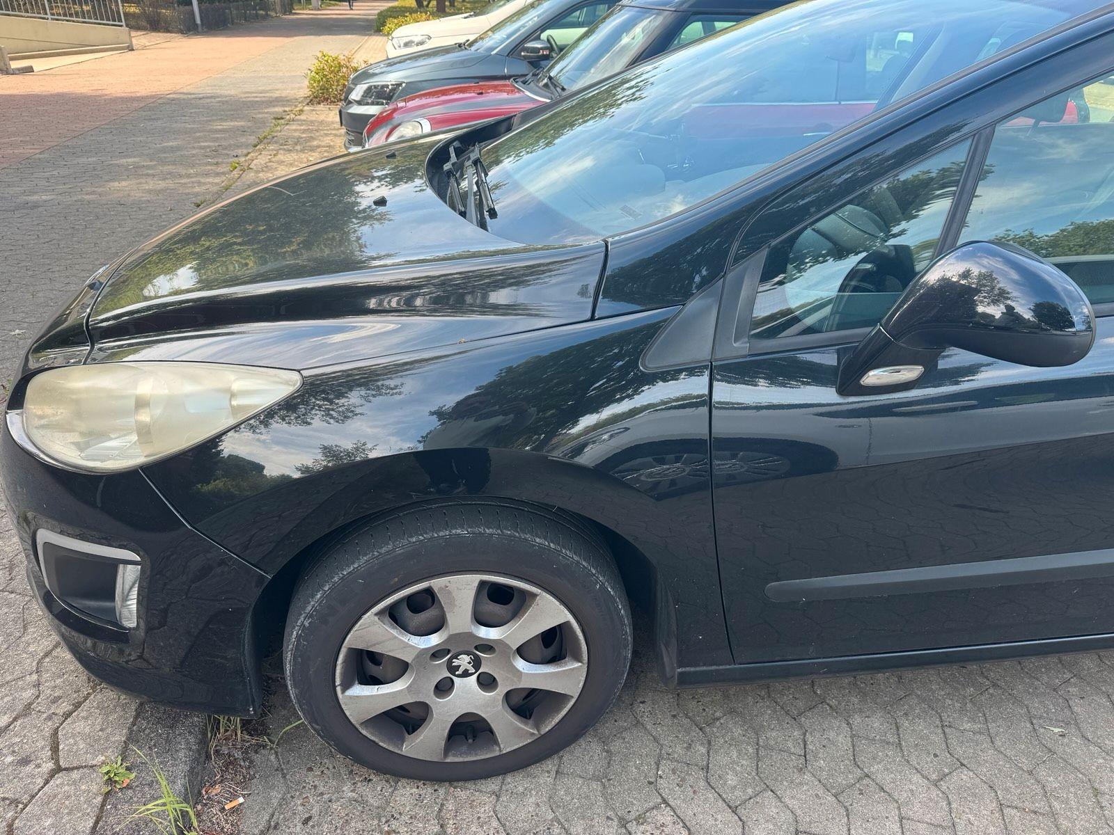 Peugeot 308 2012 — photo 5